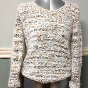 Very warm and cozy sweater. Brand new with the tag. Size M.